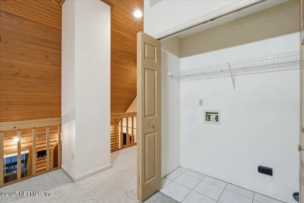 a view of a playground with basketball court