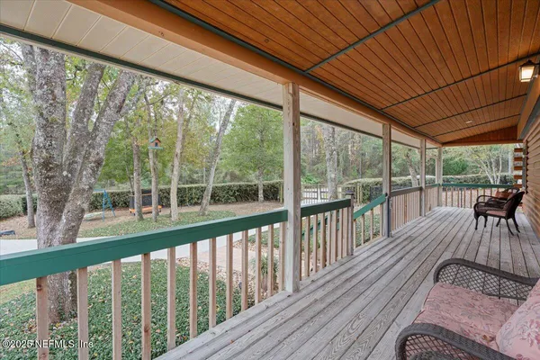 a view of livingroom with furniture and staircase