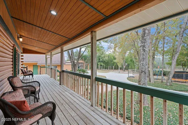 a view of a livingroom with a fireplace and furniture