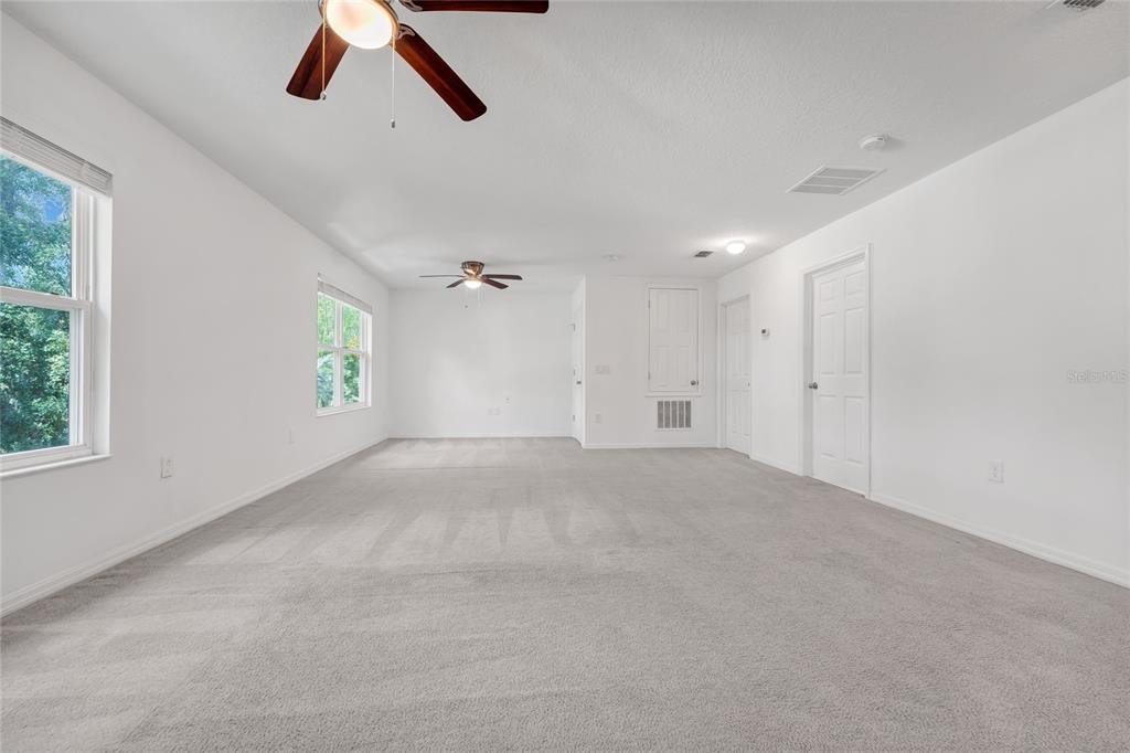 4824 Poolside Drive St. Cloud, FL 34769 - Photo 18 of 29 a view of an empty room with a window