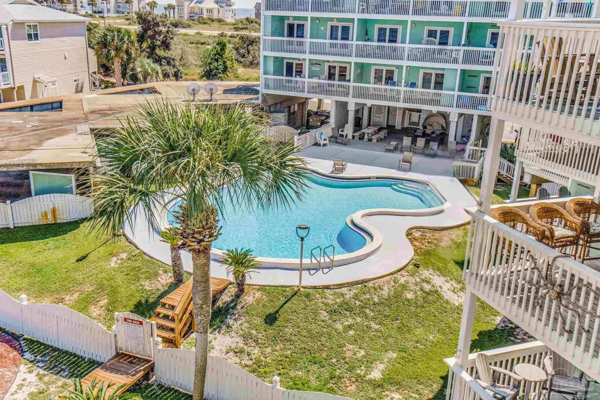 16310 Perdido Key Drive, Unit 12C Perdido Key, FL 32507 - Photo 23 of 32 a view of a swimming pool with outdoor seating