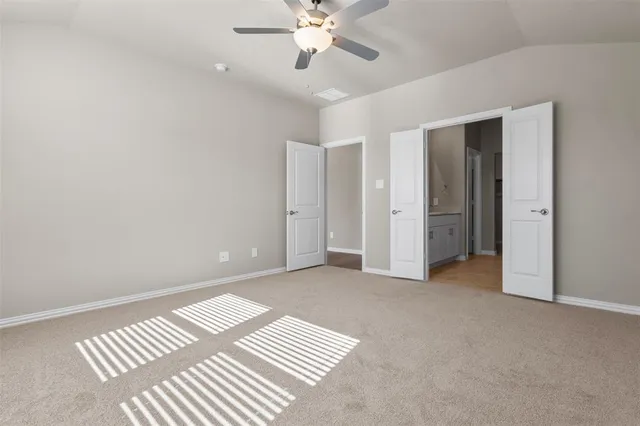 a kitchen with sink and window