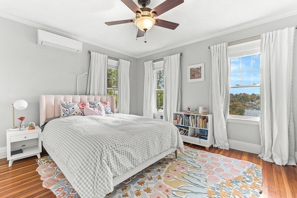 55 Redlands Road Boston, MA 02132 - Photo 18 of 42 a bedroom with a bed and a window