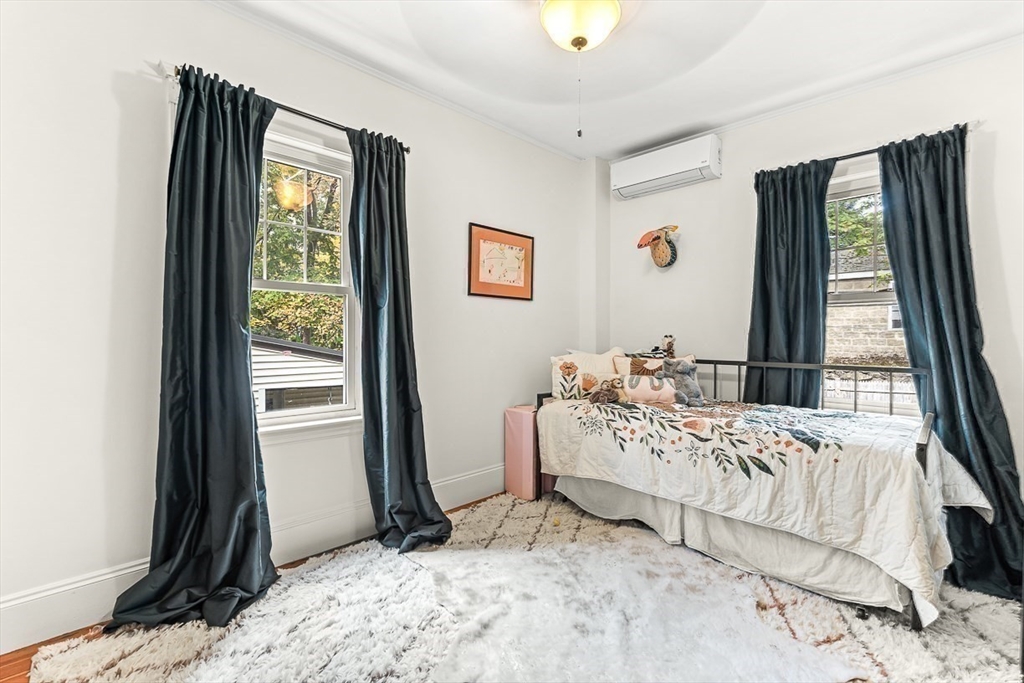 55 Redlands Road Boston, MA 02132 - Photo 21 of 42 a bed room with a bed and a window