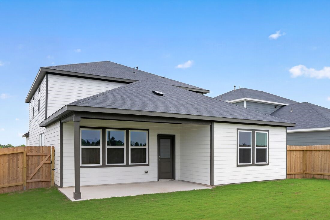 21918 Longhorn Rdg Drive Hockley, TX 77447 - Photo 26 of 46 a view of a house with a yard