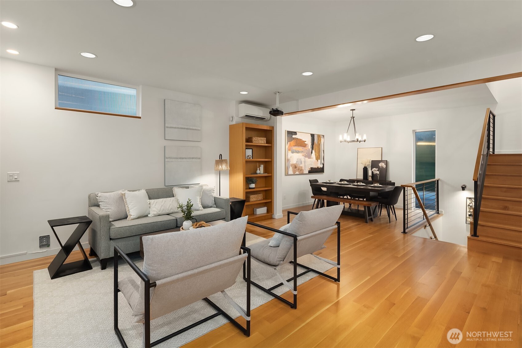1002 5th Avenue North Seattle, WA 98109 - Photo 13 of 40 a living room with furniture and wooden floor