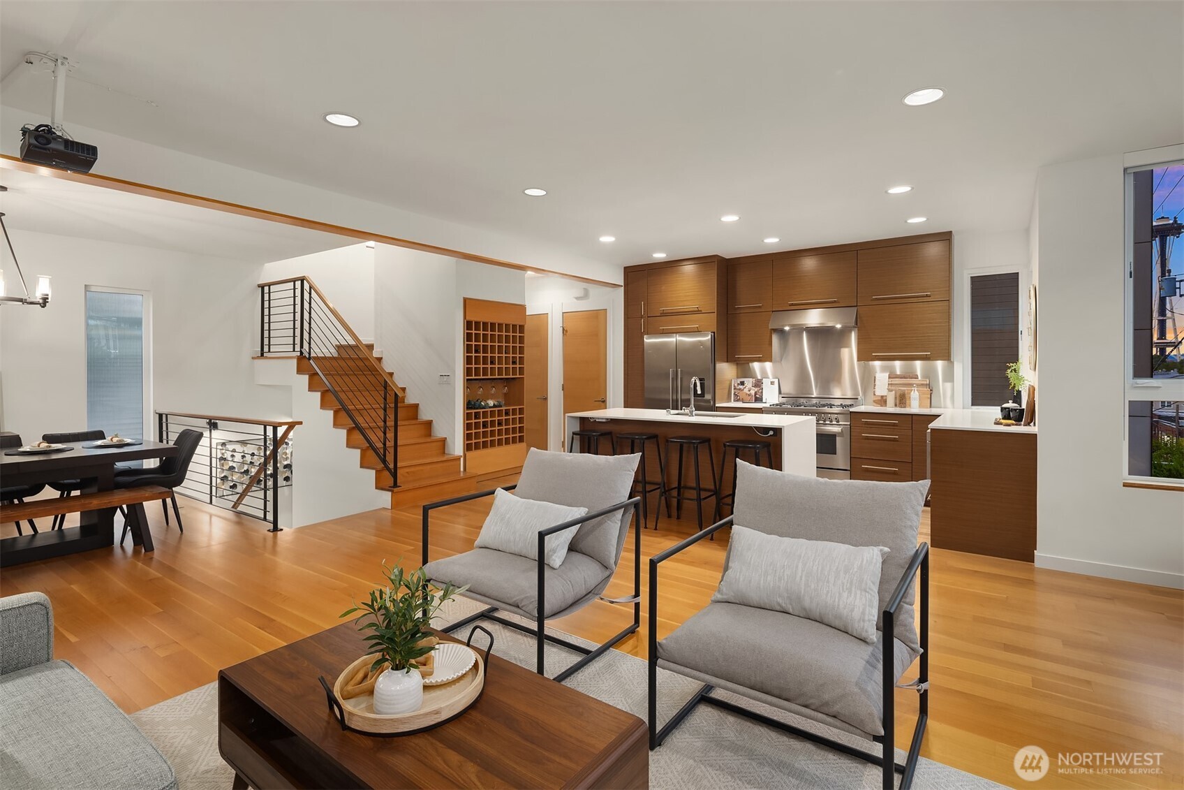 1002 5th Avenue North Seattle, WA 98109 - Photo 14 of 40 a living room with furniture and a wooden floor