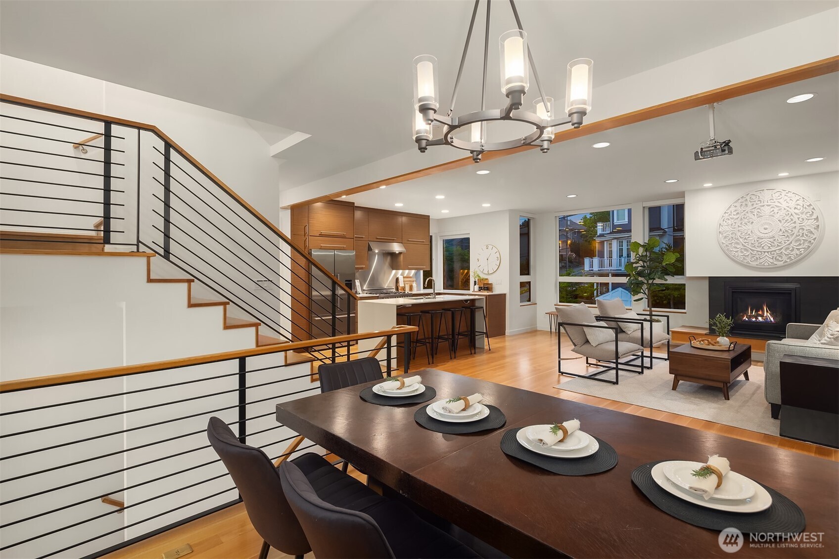 1002 5th Avenue North Seattle, WA 98109 - Photo 23 of 40 a kitchen with a table and chairs in it