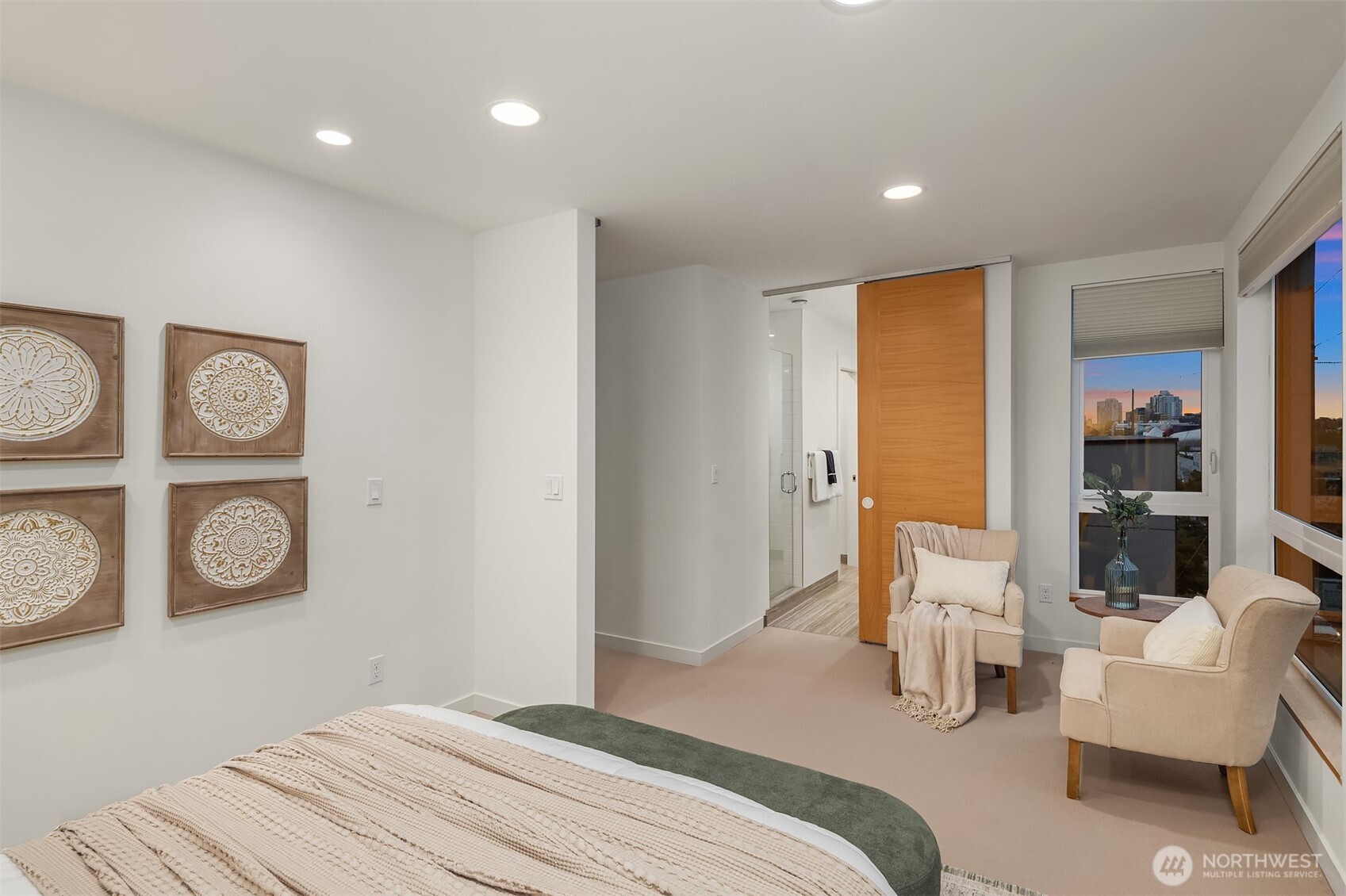 1002 5th Avenue North Seattle, WA 98109 - Photo 25 of 40 a bedroom with a bed and furniture