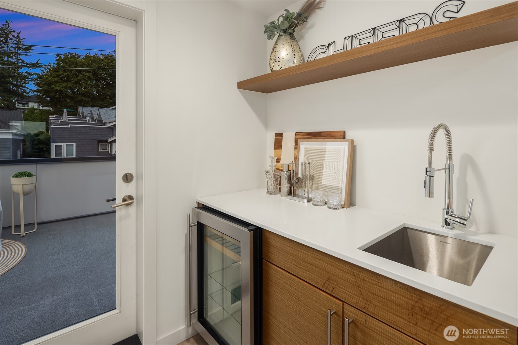 1002 5th Avenue North Seattle, WA 98109 - Photo 32 of 40 a bathroom with a sink and a mirror