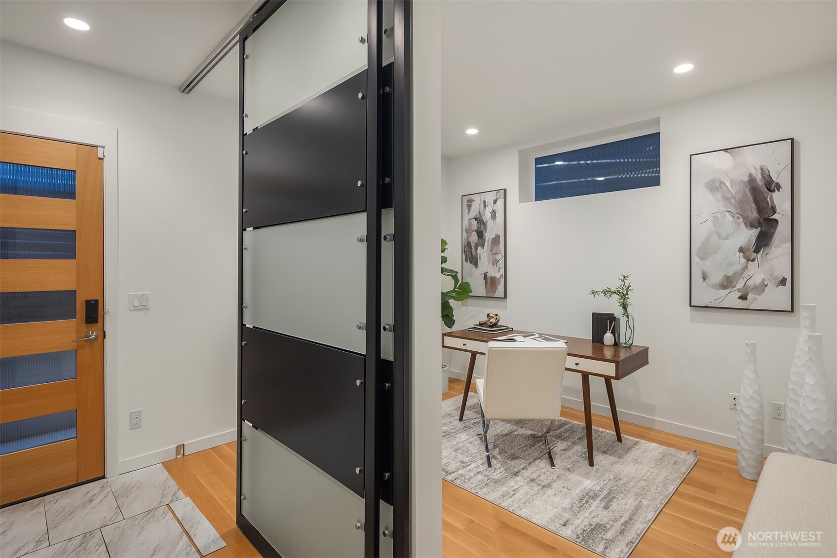 1002 5th Avenue North Seattle, WA 98109 - Photo 5 of 40 a work room with furniture and a table