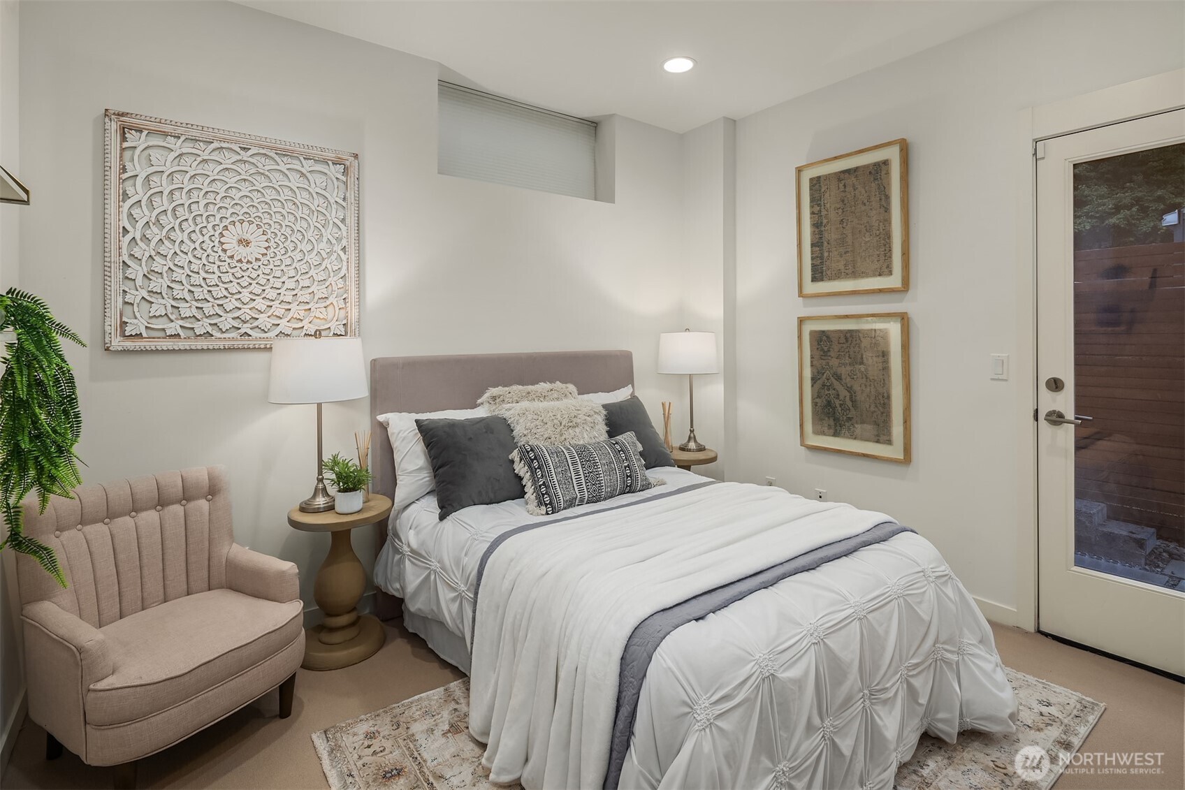 1002 5th Avenue North Seattle, WA 98109 - Photo 8 of 40 a bedroom with bed and a couch