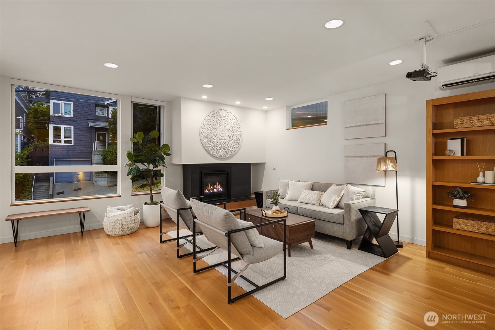 1002 5th Avenue North Seattle, WA 98109 - Photo 9 of 40 a living room with furniture and a fireplace