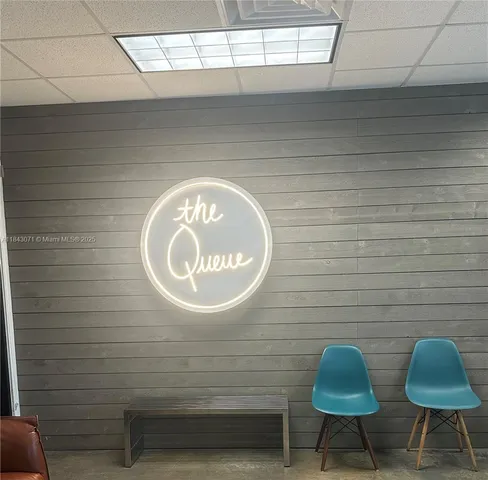 a bathroom with a toilet and a sink