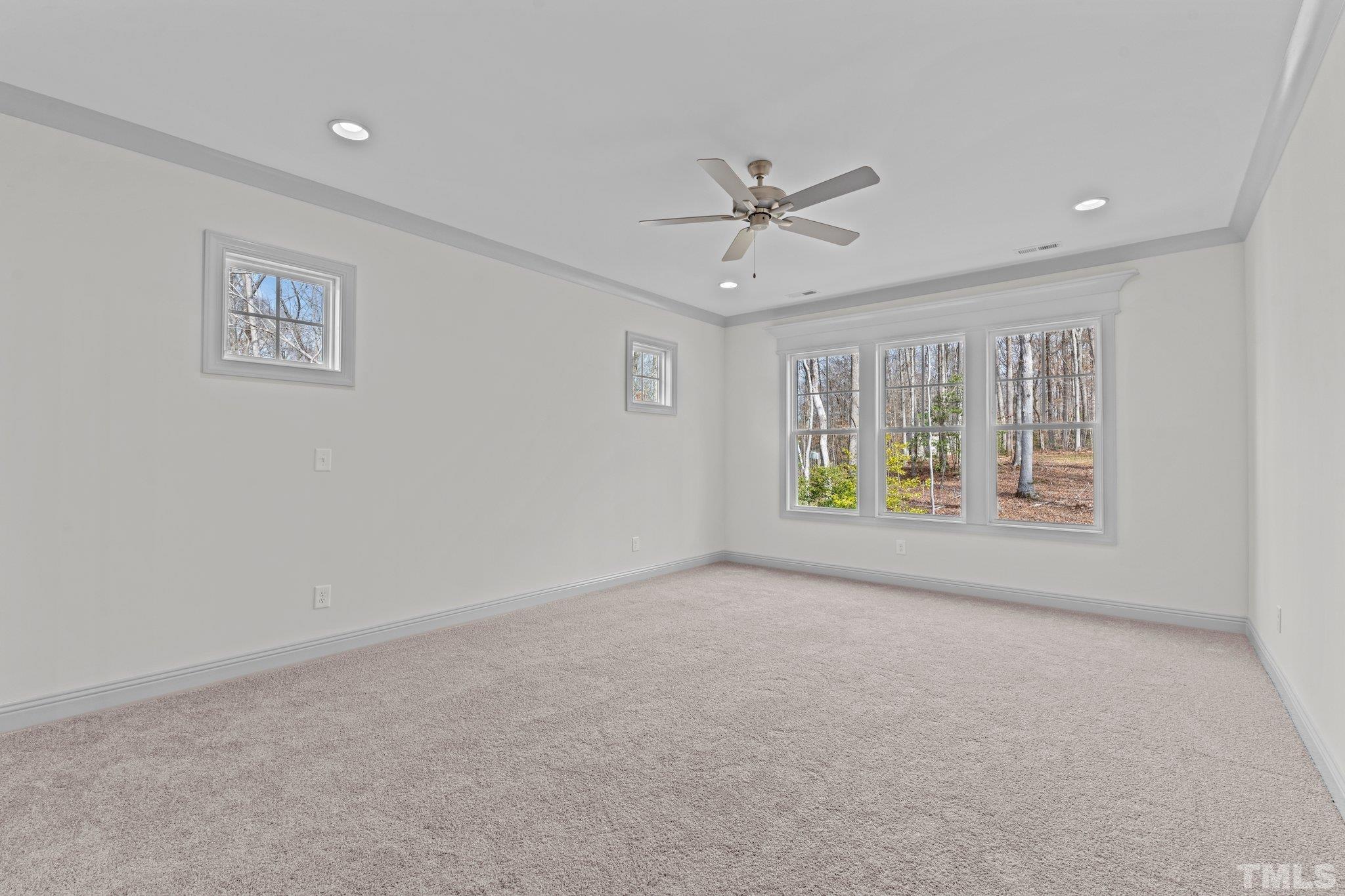 456 Reese Drive Willow Spring, NC 27592 - Photo 20 of 50 a view of an empty room with a window