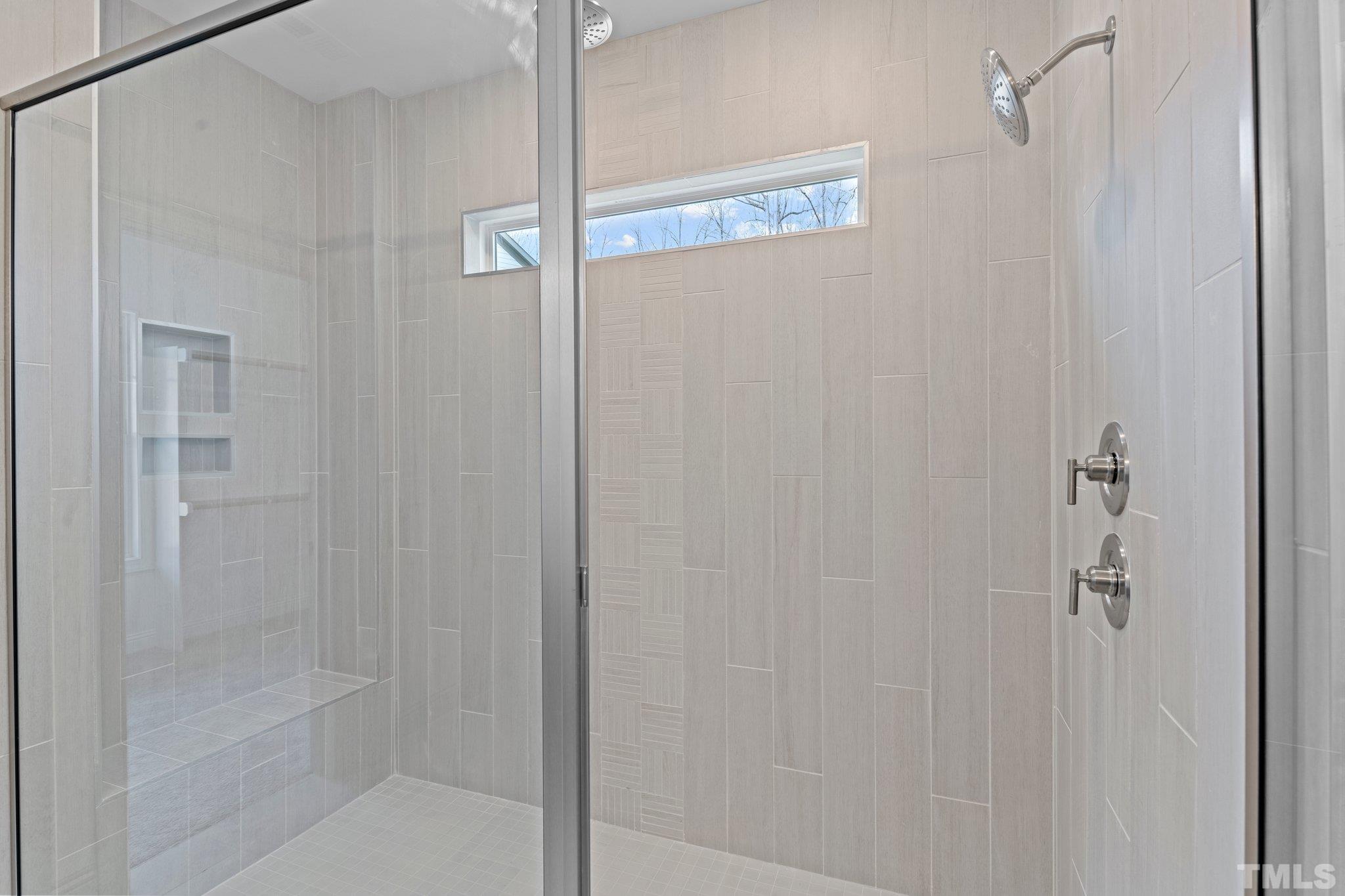 456 Reese Drive Willow Spring, NC 27592 - Photo 24 of 50 a bathroom with a shower