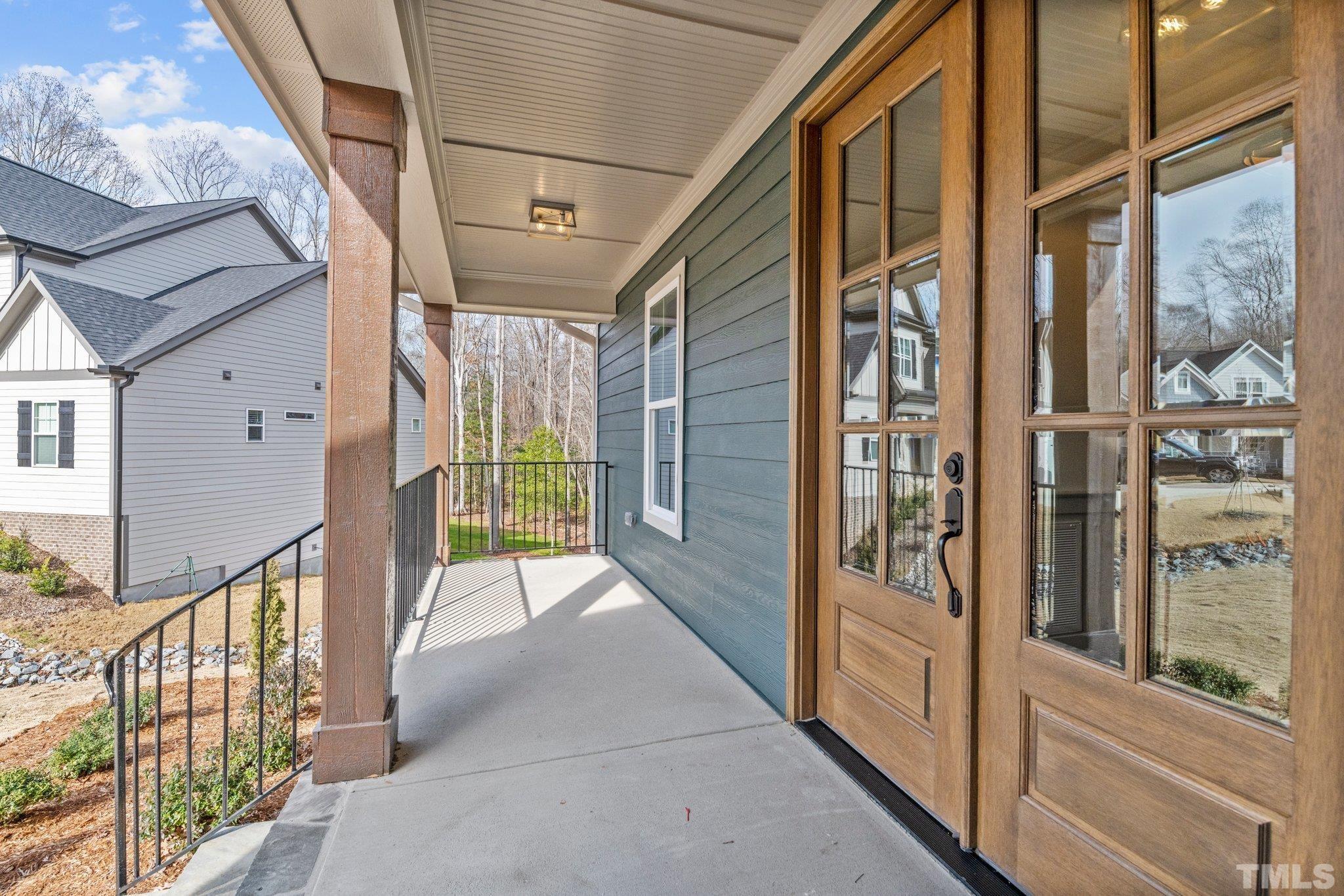 456 Reese Drive Willow Spring, NC 27592 - Photo 5 of 50 a view of a porch of the house
