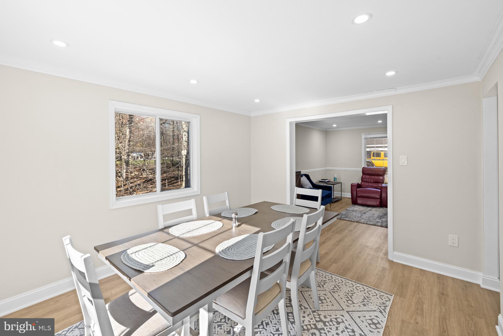 2907 Accokeek Road West Accokeek, MD 20607 - Photo 14 of 42 a view of a dining room with furniture and wooden floor