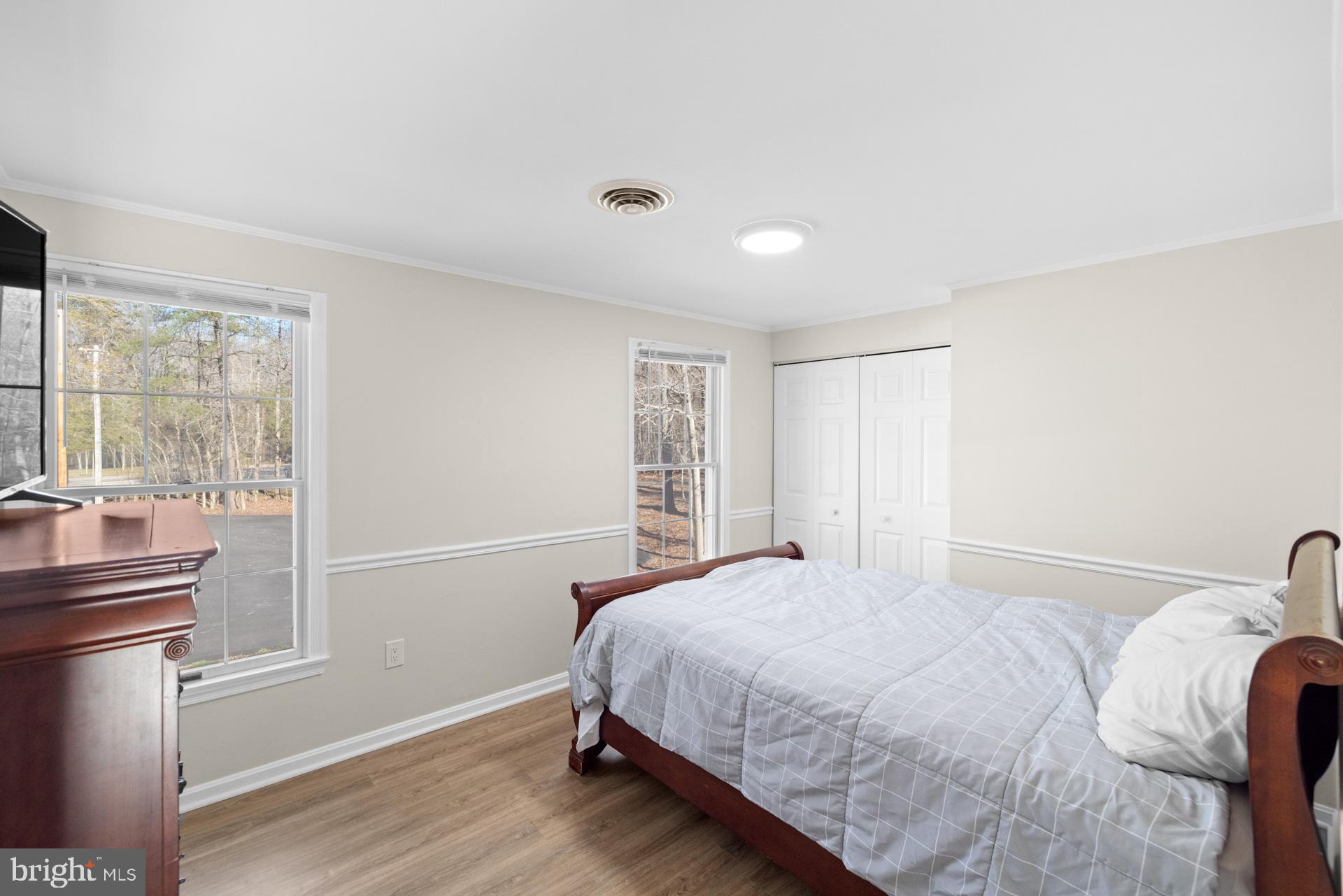 2907 Accokeek Road West Accokeek, MD 20607 - Photo 32 of 42 a bedroom with a bed and a window