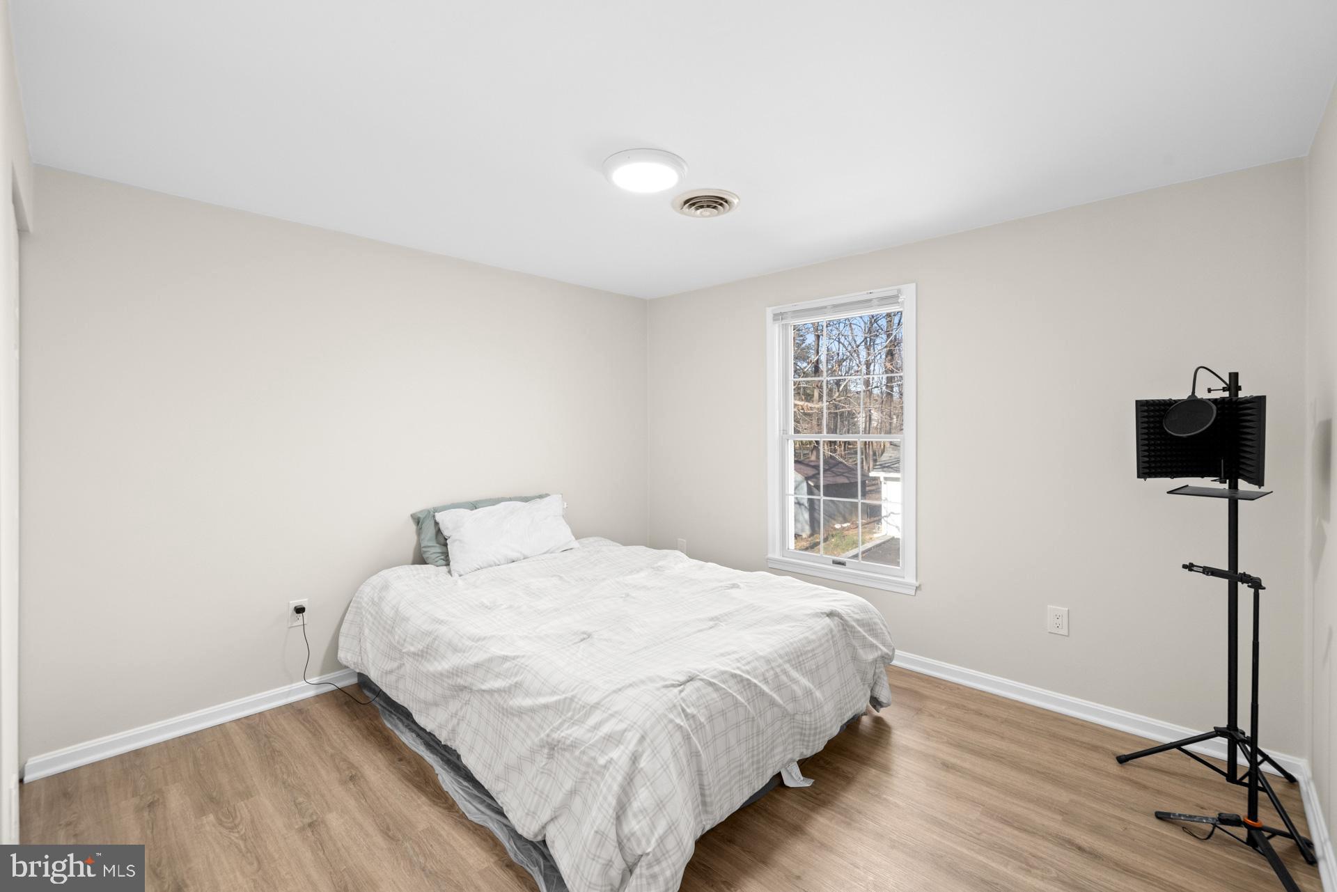 2907 Accokeek Road West Accokeek, MD 20607 - Photo 34 of 42 a bedroom with a bed and a window