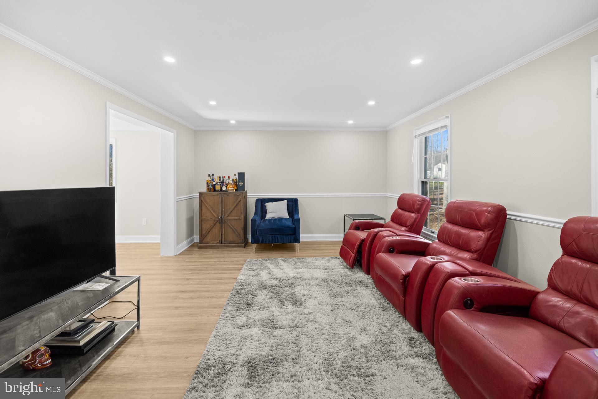 2907 Accokeek Road West Accokeek, MD 20607 - Photo 10 of 42 a living room with furniture and a flat screen tv
