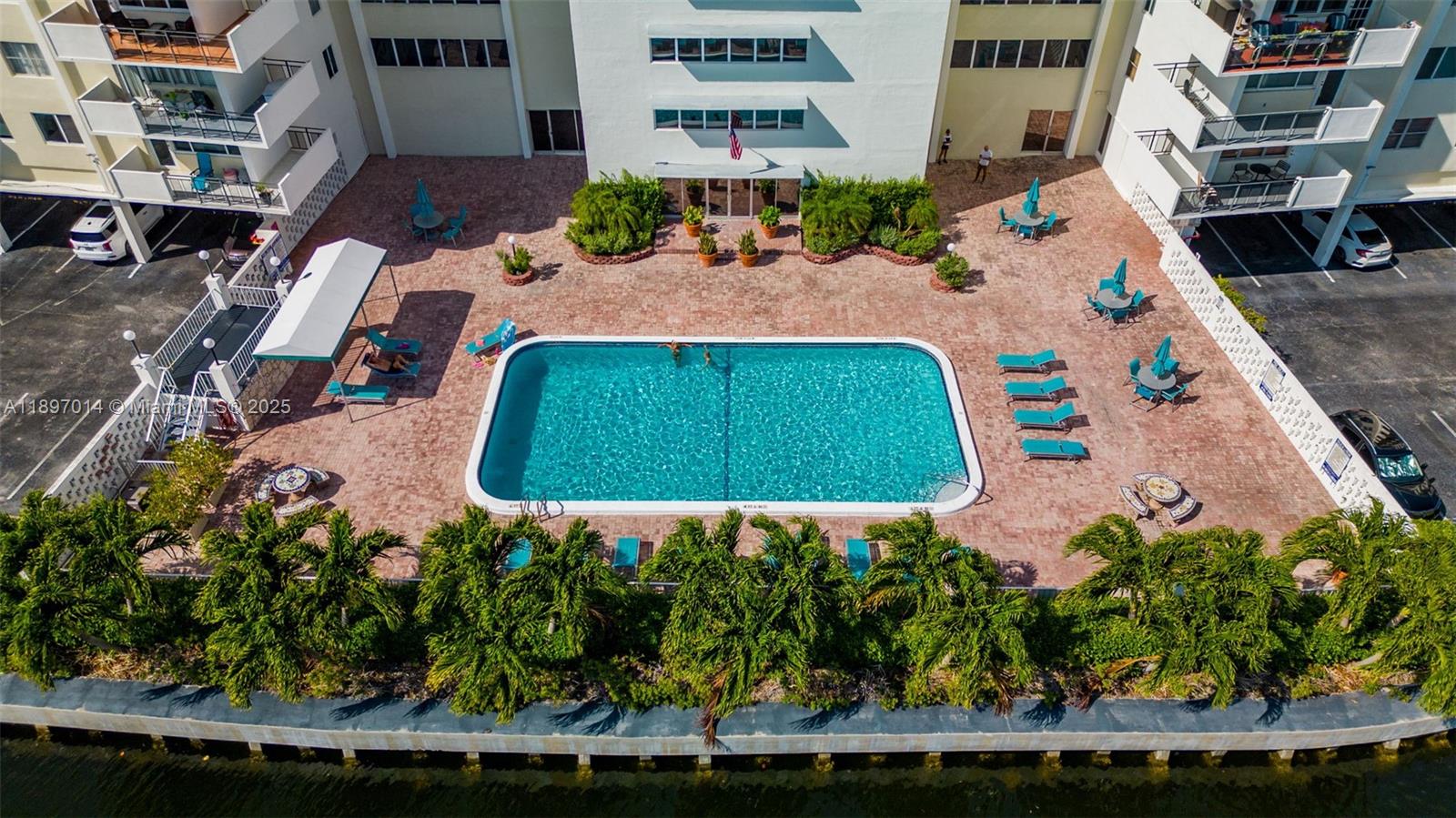 401 Golden Isles Drive, Unit 304 Hallandale Beach, FL 33009 - Photo 27 of 43 an aerial view of a house