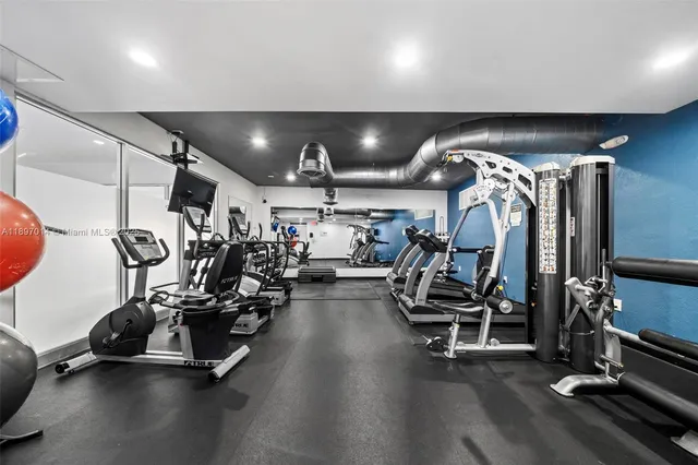 a view of a room with gym equipment