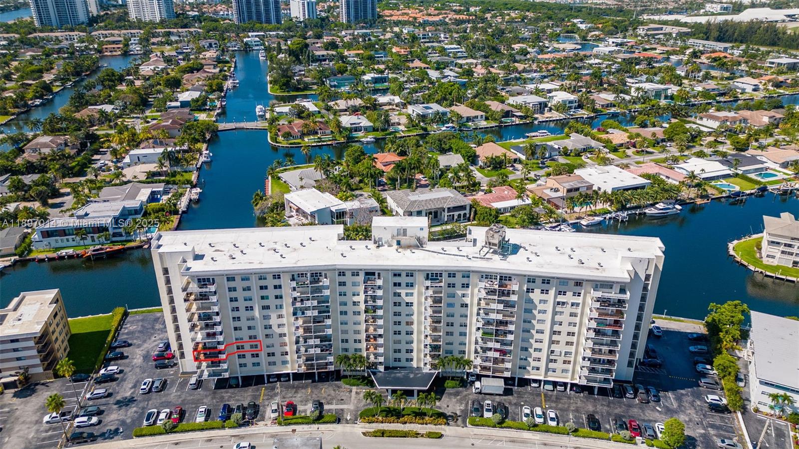 401 Golden Isles Drive, Unit 304 Hallandale Beach, FL 33009 - Photo 37 of 43 a large building with a city view