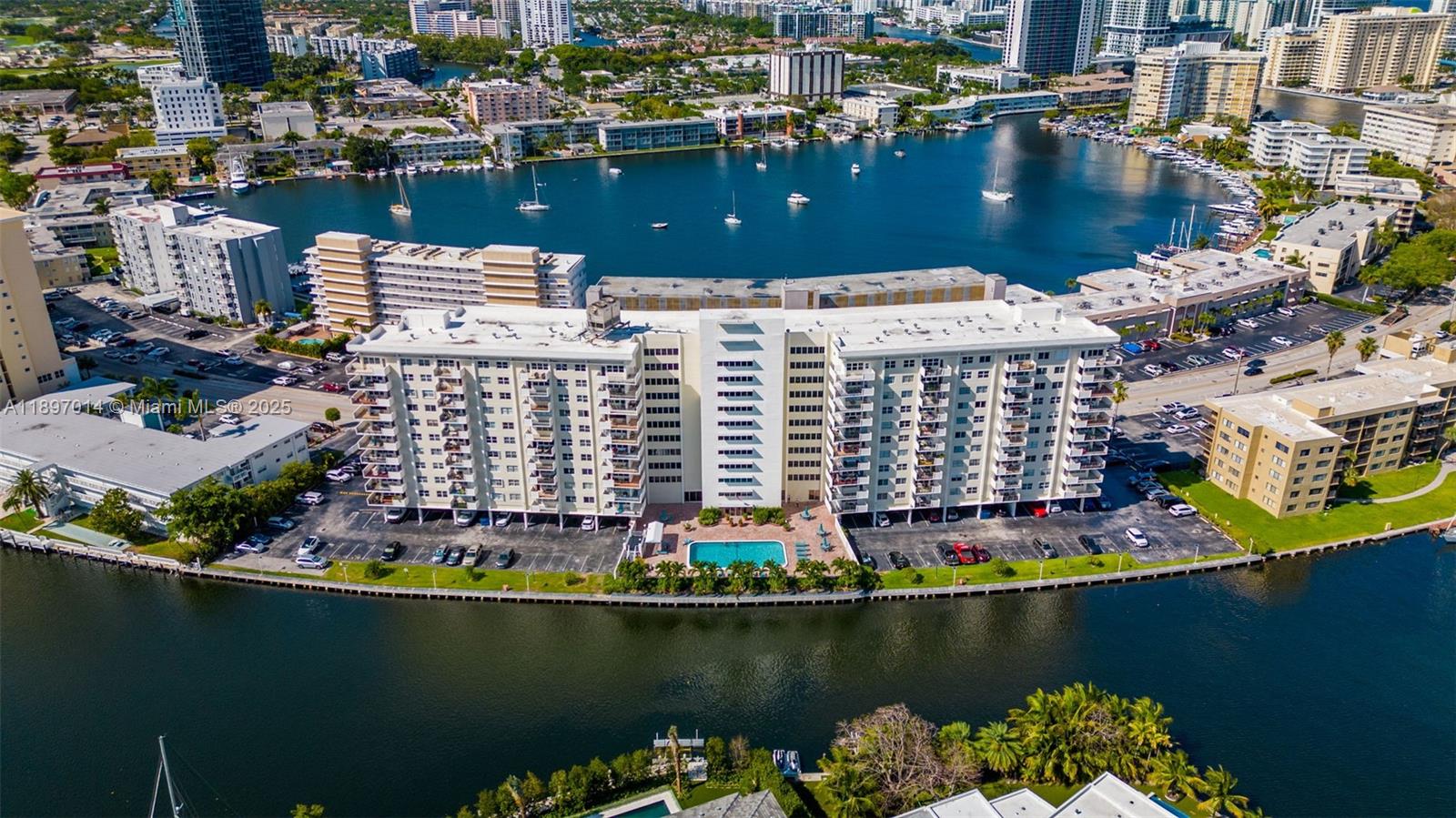 401 Golden Isles Drive, Unit 304 Hallandale Beach, FL 33009 - Photo 42 of 43 a view of a city with water