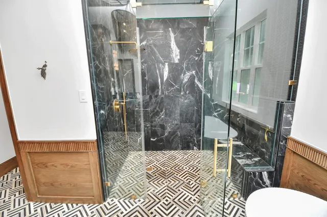 a bathroom with a sink and toilet