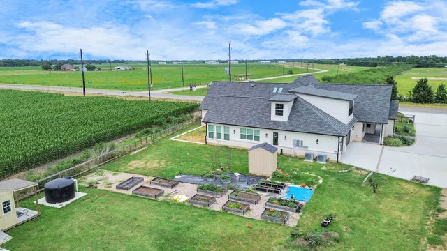 a house view with a garden space