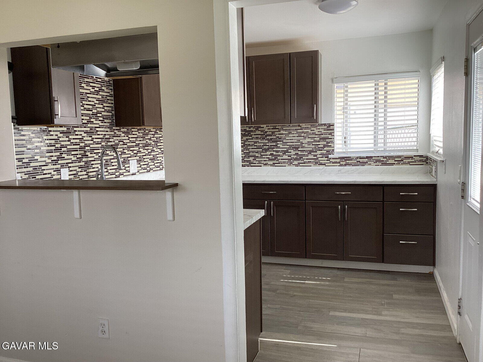 43324 45th Street West Lancaster, CA 93536 - Photo 3 of 10 a bathroom with a sink and a mirror