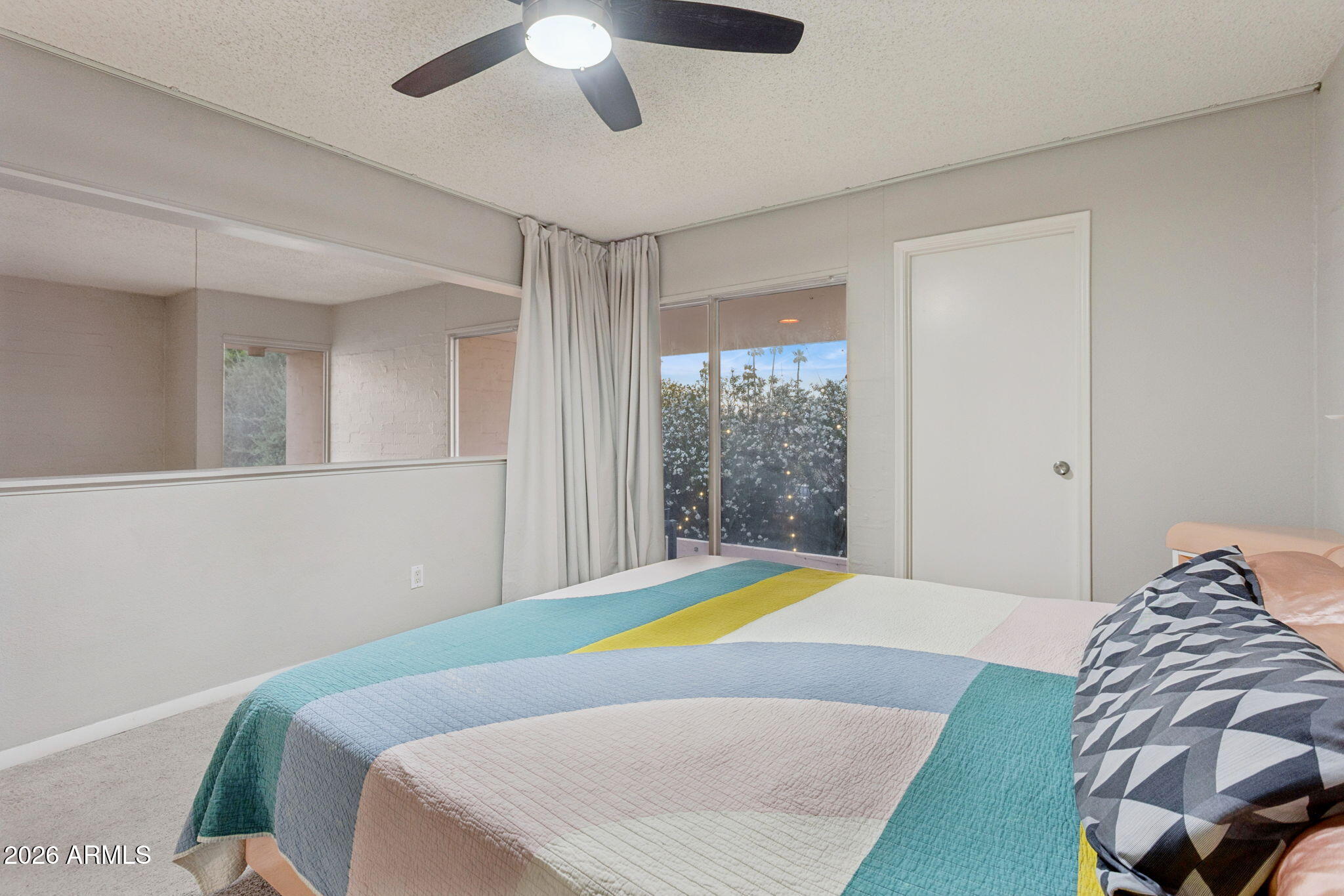 930 South Dobson Road, Unit 7 Mesa, AZ 85202 - Photo 33 of 57 Primary with curtains for privacy
