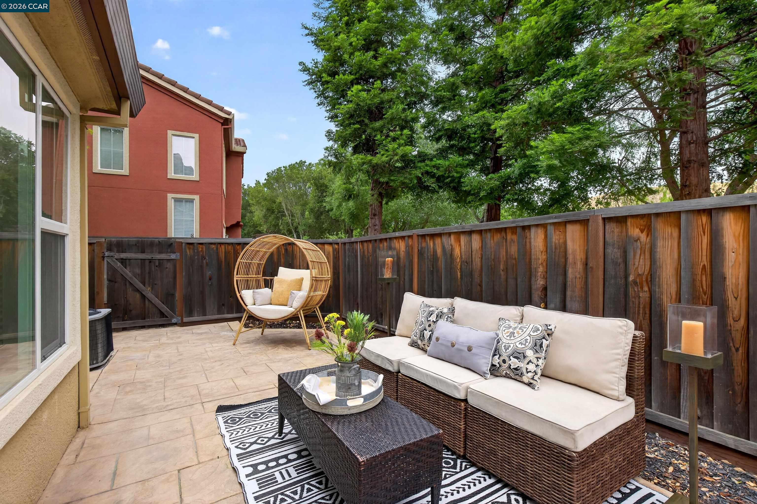 124 Coralflower Lane San Ramon, CA 94582 - Photo 30 of 47 a backyard of a house with fire pit and outdoor seating