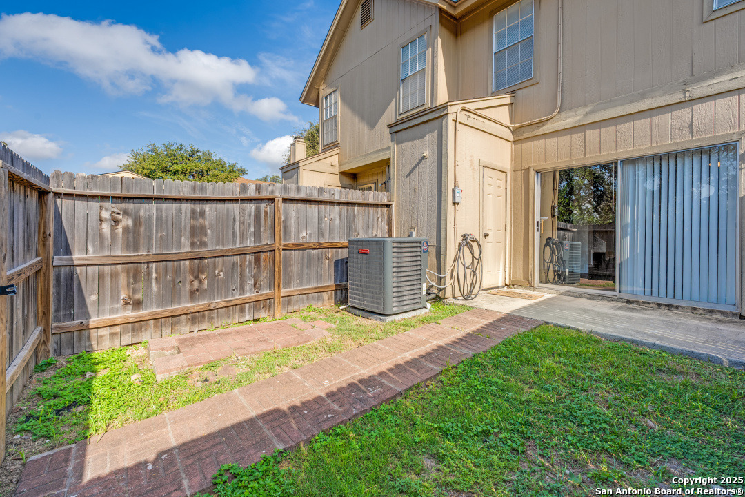 10254 Dover Ridge, Unit 204 San Antonio, TX 78250 - Photo 28 of 31 a view of a backyard with a garden and stairs