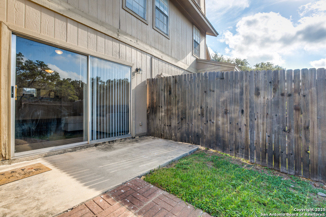 10254 Dover Ridge, Unit 204 San Antonio, TX 78250 - Photo 29 of 31 a view of a backyard