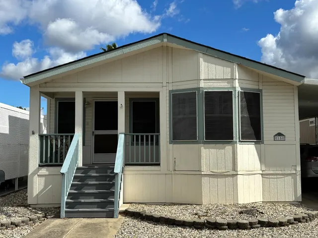 a view of a house with a balcony