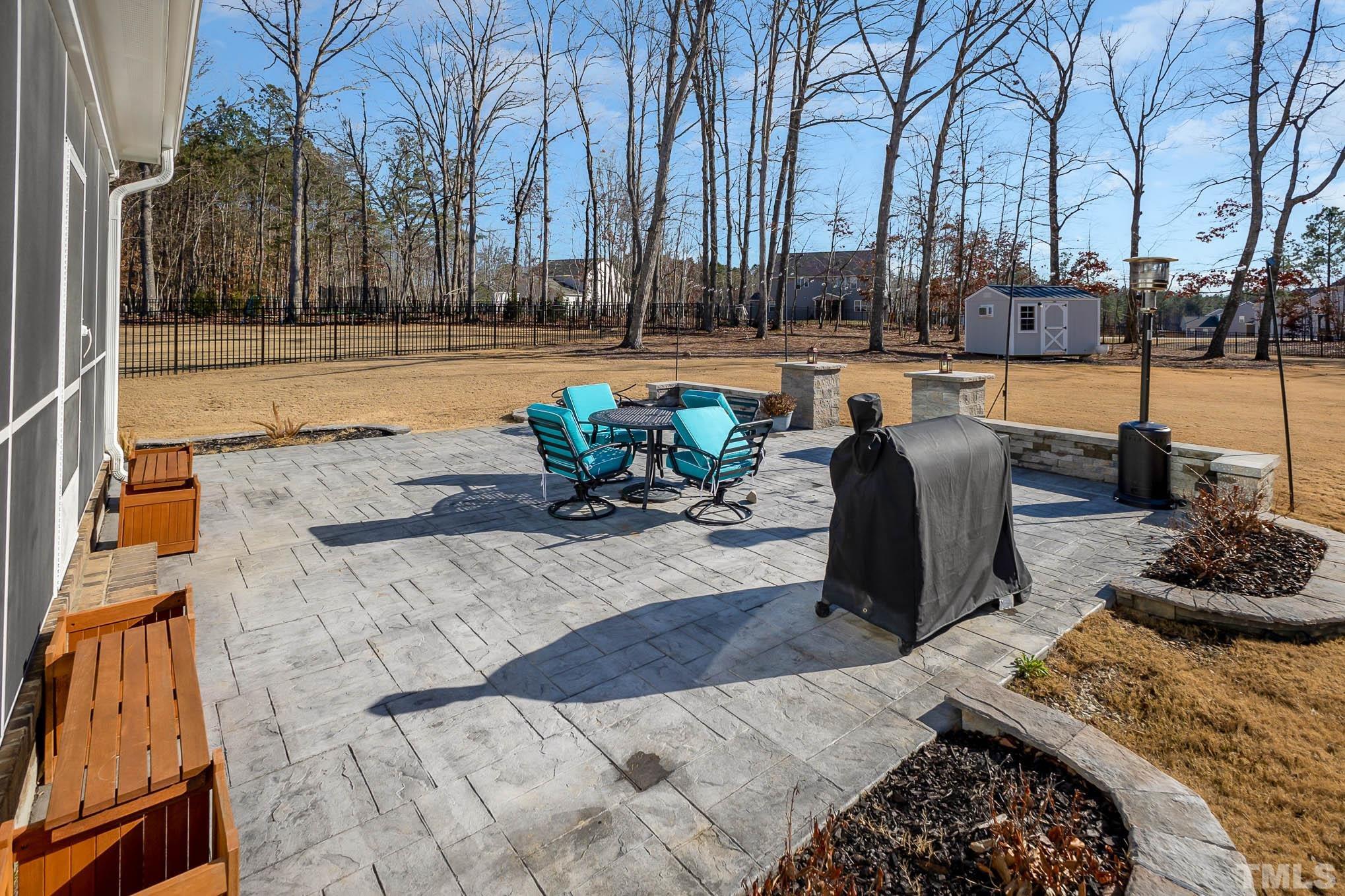 8801 Rainer Way Wake Forest, NC 27587 - Photo 30 of 34 a view of a swimming pool with a lounge chair