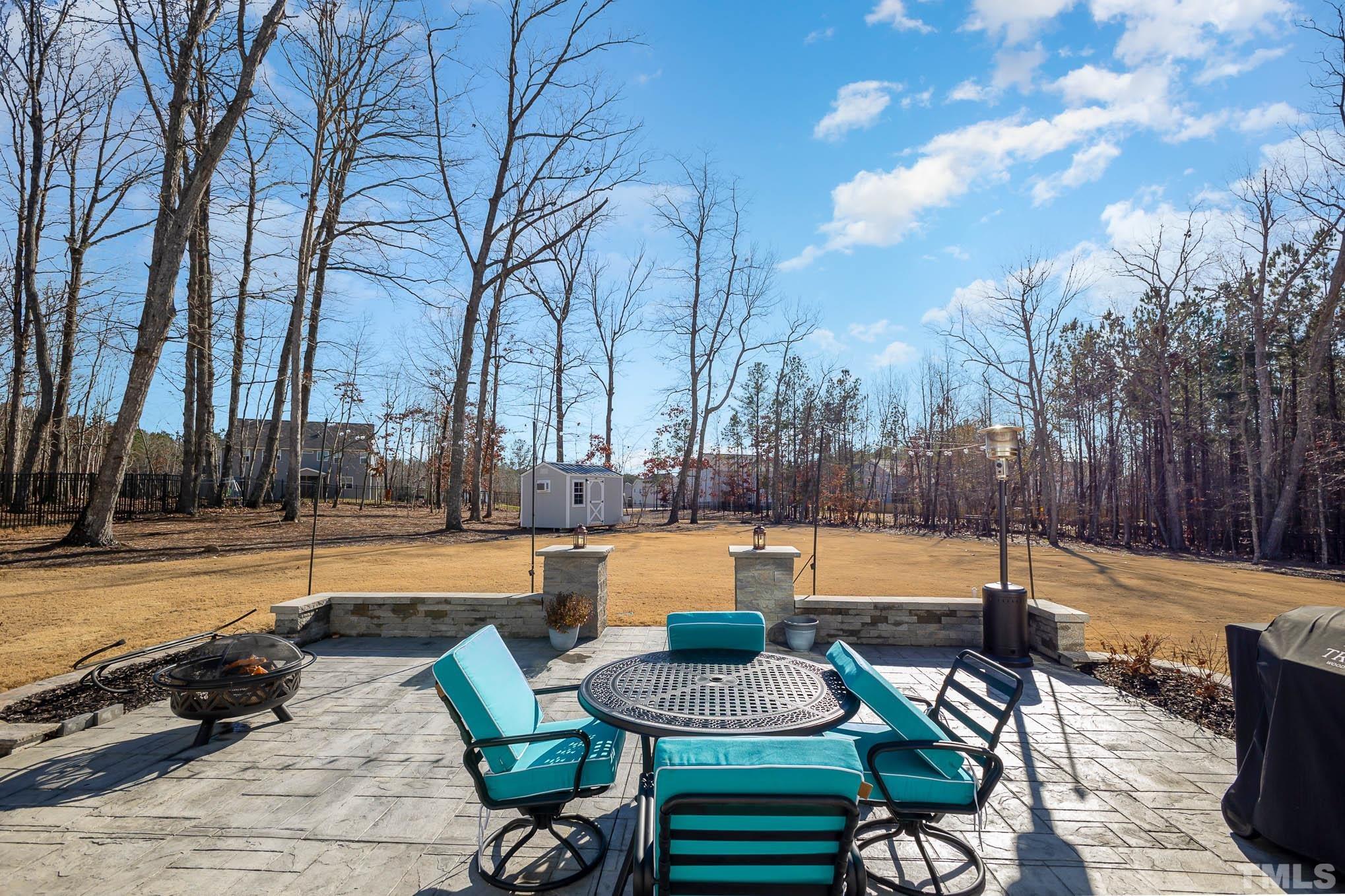 8801 Rainer Way Wake Forest, NC 27587 - Photo 31 of 34 a view of swimming pool with chairs and lake