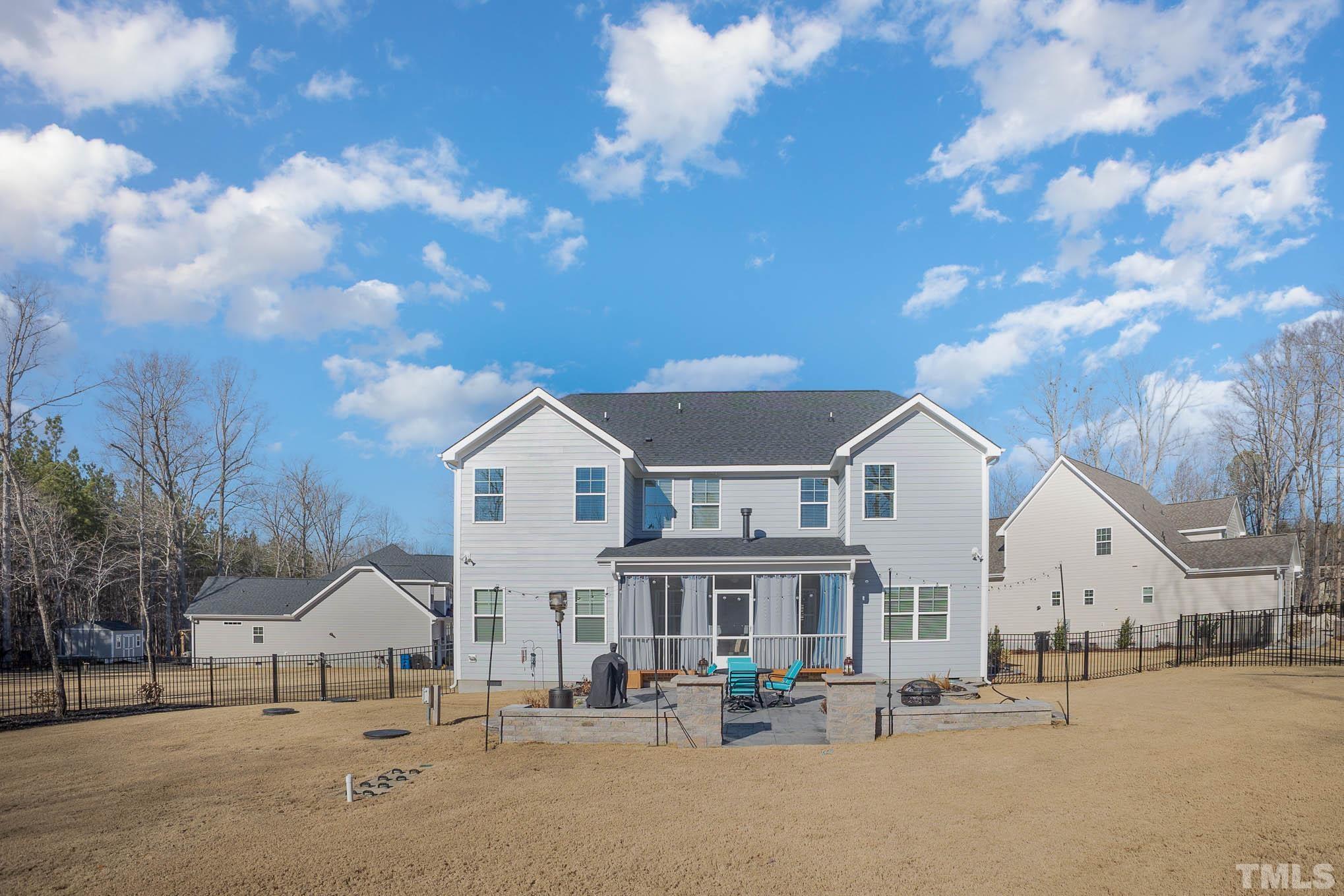 8801 Rainer Way Wake Forest, NC 27587 - Photo 32 of 34 a view of building with car parked