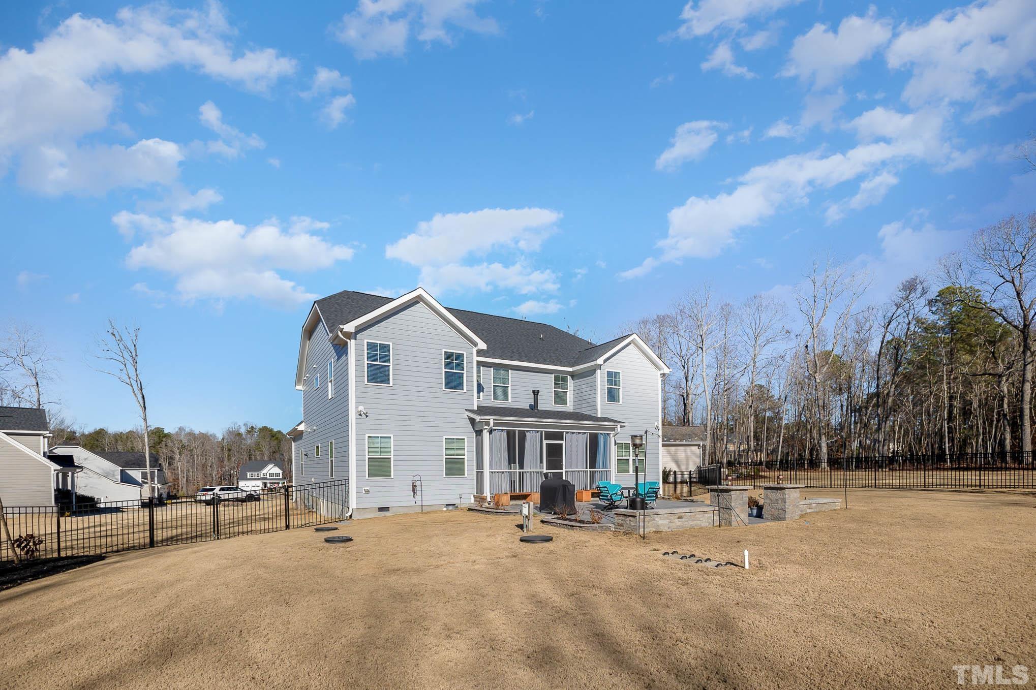 8801 Rainer Way Wake Forest, NC 27587 - Photo 33 of 34 a view of a house with outdoor space