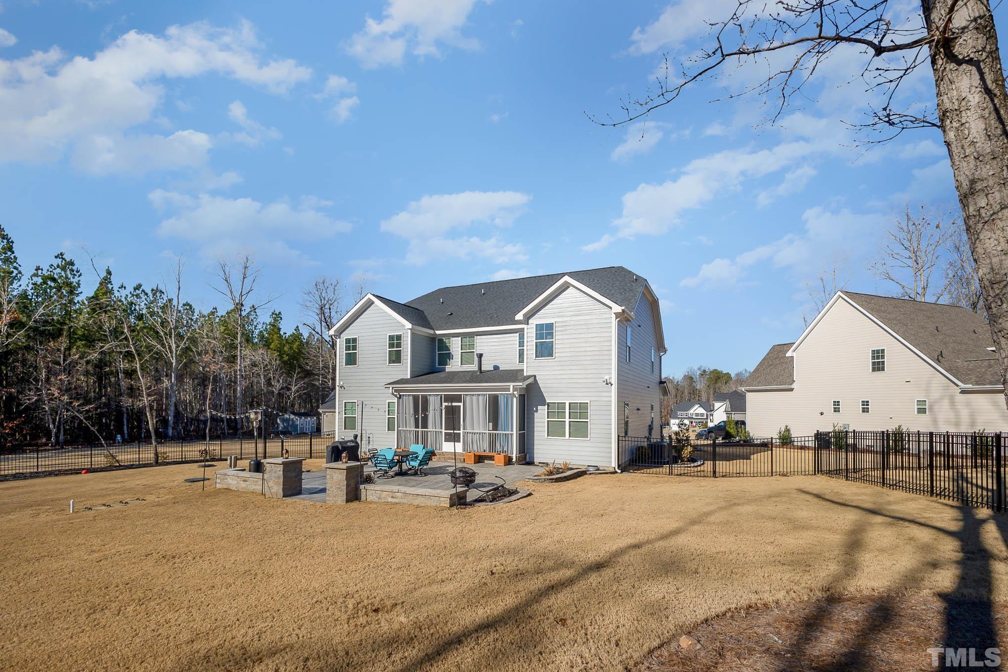 8801 Rainer Way Wake Forest, NC 27587 - Photo 34 of 34 a view of a house with outdoor space and sitting area
