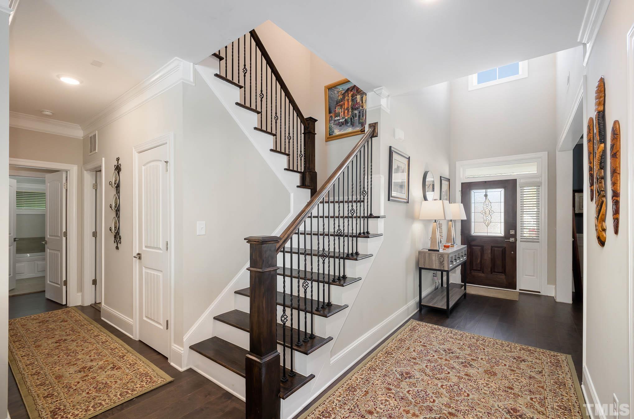 8801 Rainer Way Wake Forest, NC 27587 - Photo 5 of 34 a view of entryway and hall with wooden floor