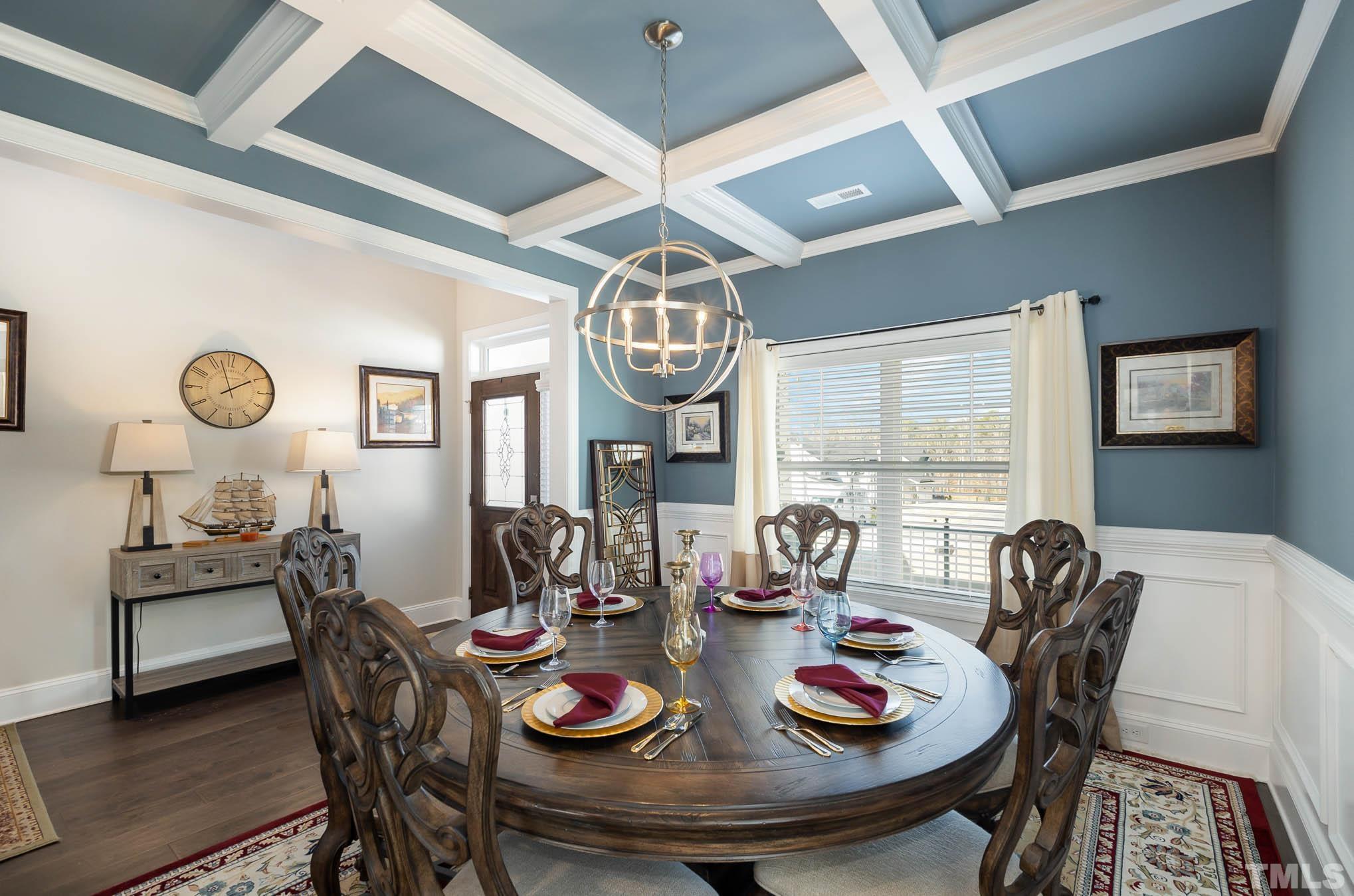 8801 Rainer Way Wake Forest, NC 27587 - Photo 9 of 34 a view of a dining room with furniture