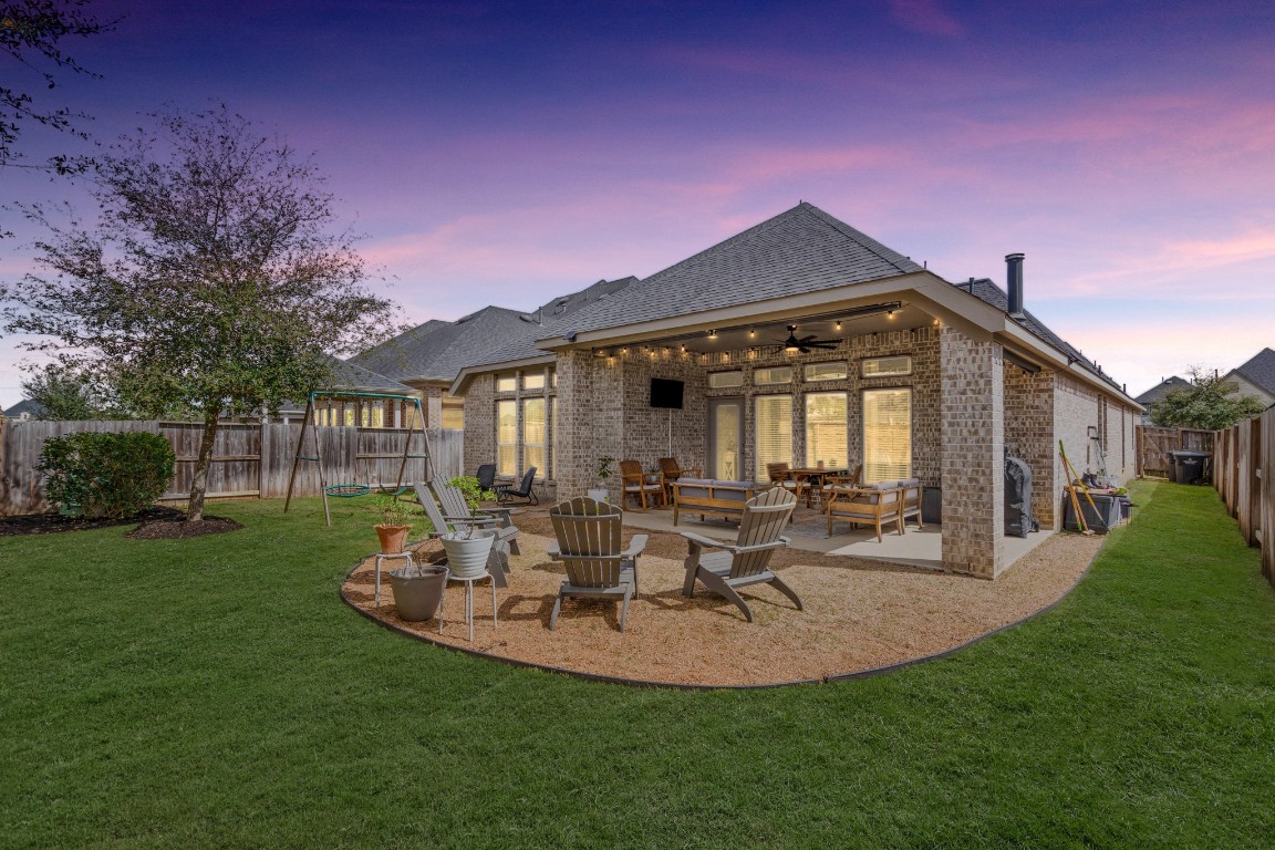 6918 Goldstrum Way Katy, TX 77493 - Photo 21 of 27 a view of a house with backyard porch and sitting area
