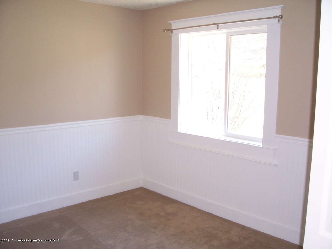 369 South 9th Street Rifle, CO 81650 - Photo 6 of 9 an empty room with a window