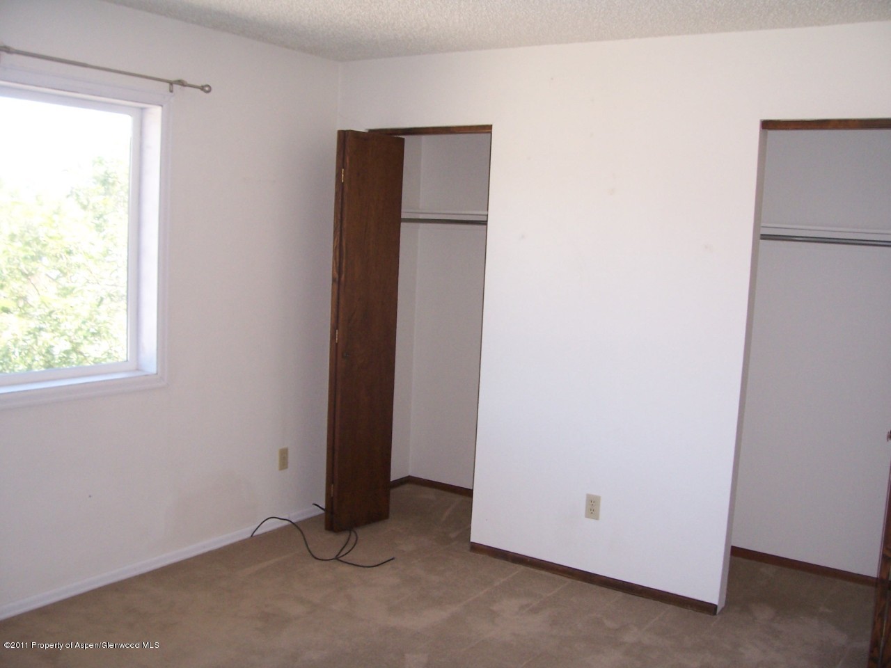 369 South 9th Street Rifle, CO 81650 - Photo 8 of 9 a view of an empty room with a window