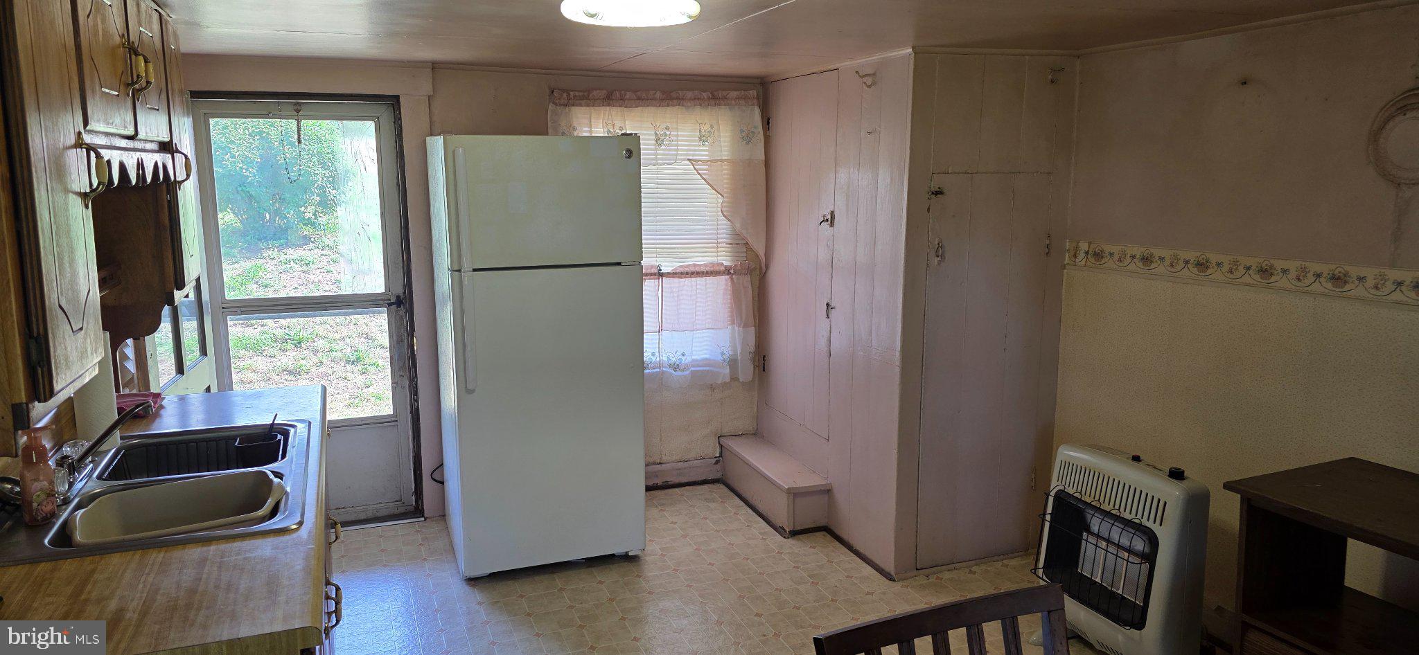 9000 Corner Road Hancock, MD 21750 - Photo 11 of 13 Cozy kitchen with natural light.