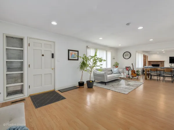 a living room with furniture and a table