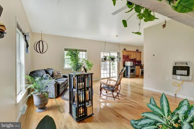 a view of a living room with a large window
